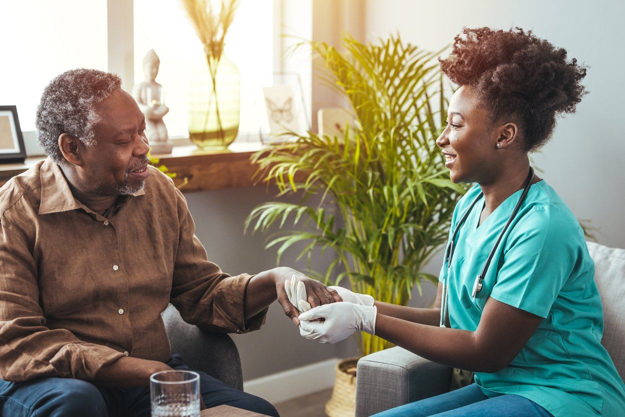 Nurse with elderly patient