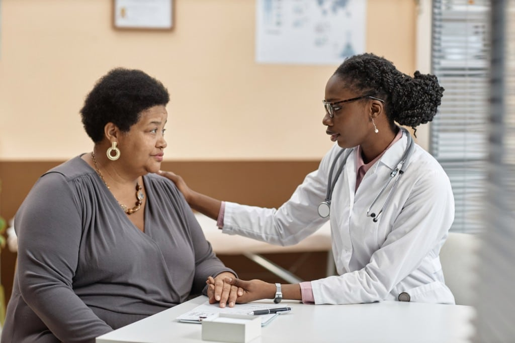 Nurse with elderly patient